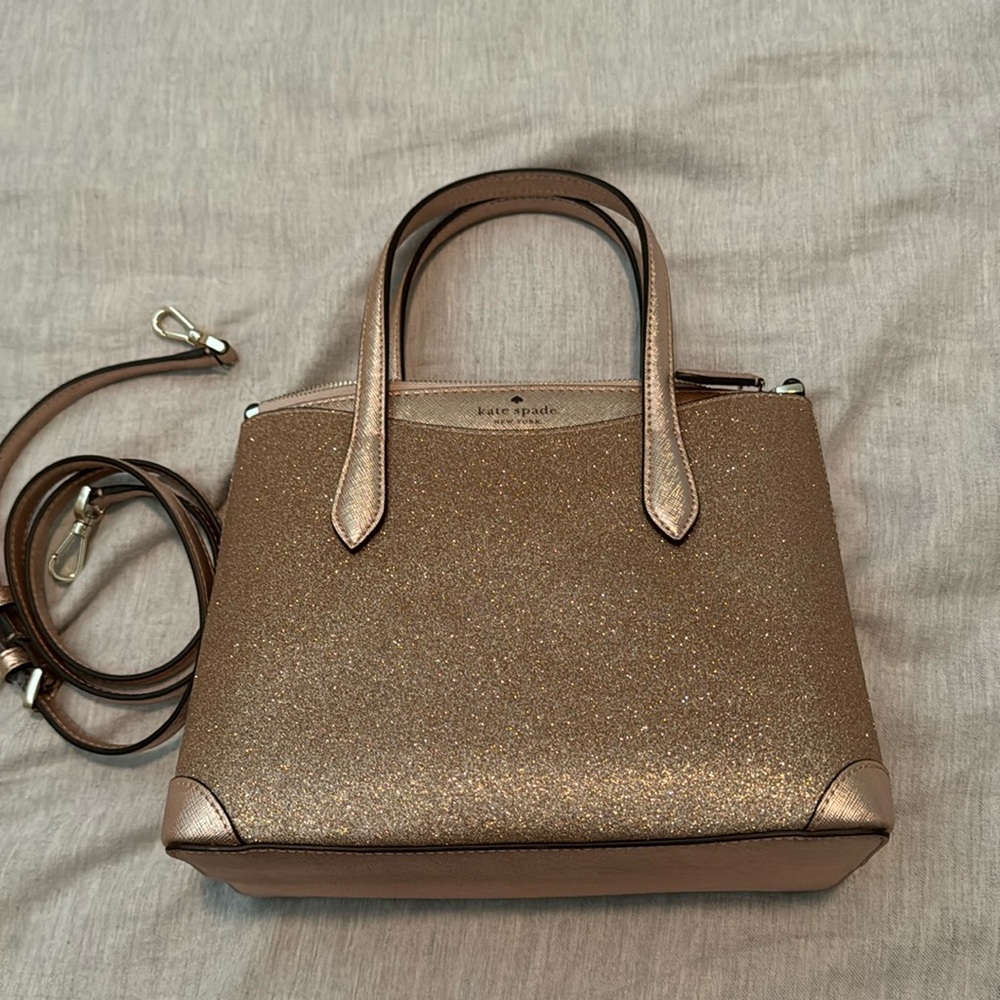 Kate spade tinsel glittery rose gold crossbody. Strap included.